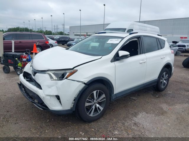 Photo 1 VIN: JTMRFREV7GJ092369 - TOYOTA RAV4 