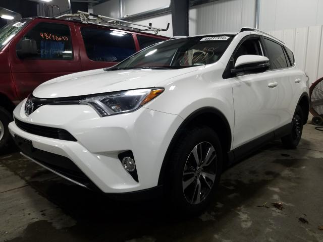 Photo 1 VIN: JTMRFREV8GJ100320 - TOYOTA RAV4 XLE 