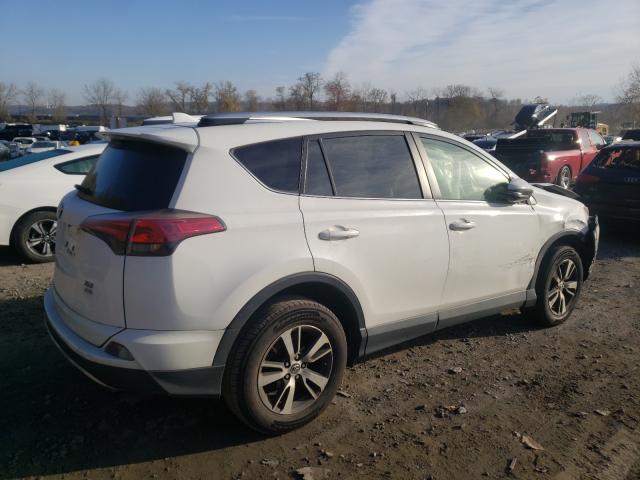 Photo 3 VIN: JTMRFREV9GJ060166 - TOYOTA RAV4 XLE 