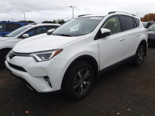 Photo 1 VIN: JTMRFREV9GJ098271 - TOYOTA RAV4 XLE 