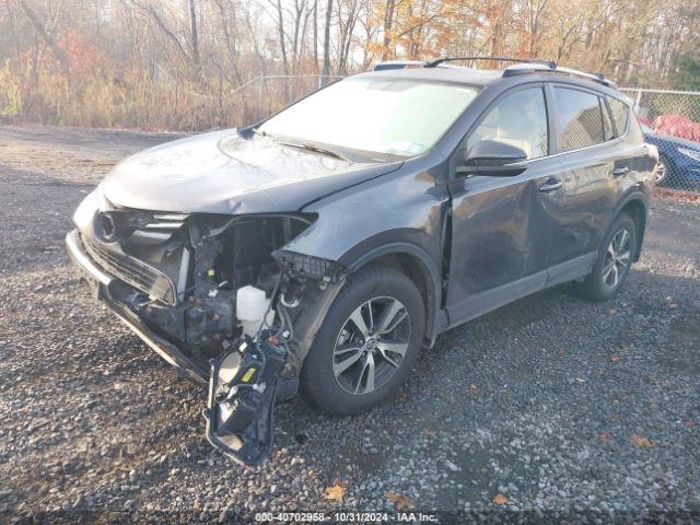 Photo 1 VIN: JTMRFREV9GJ104196 - TOYOTA RAV4 