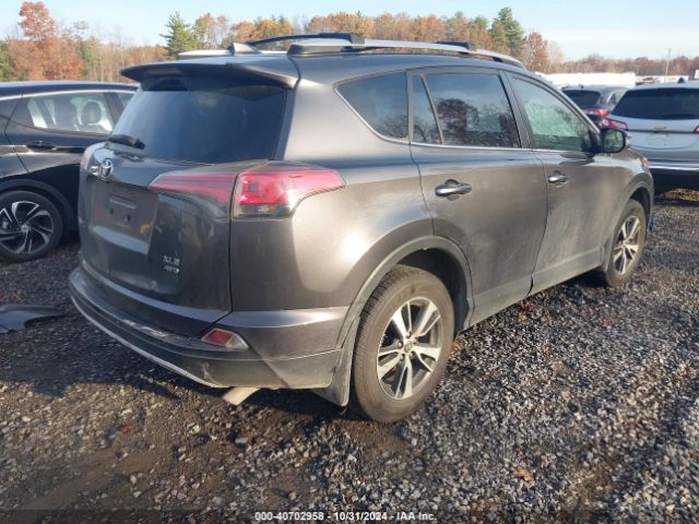 Photo 3 VIN: JTMRFREV9GJ104196 - TOYOTA RAV4 