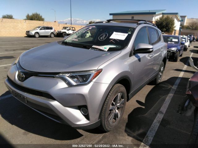 Photo 1 VIN: JTMRFREV9JD241709 - TOYOTA RAV4 