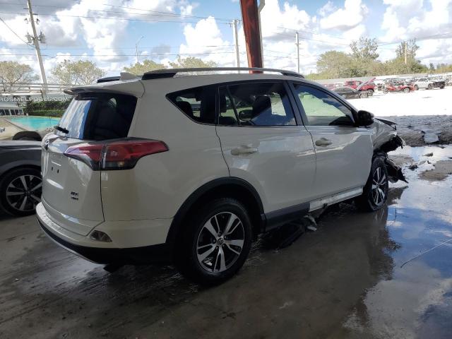 Photo 2 VIN: JTMRFREVXGJ056899 - TOYOTA RAV4 XLE 