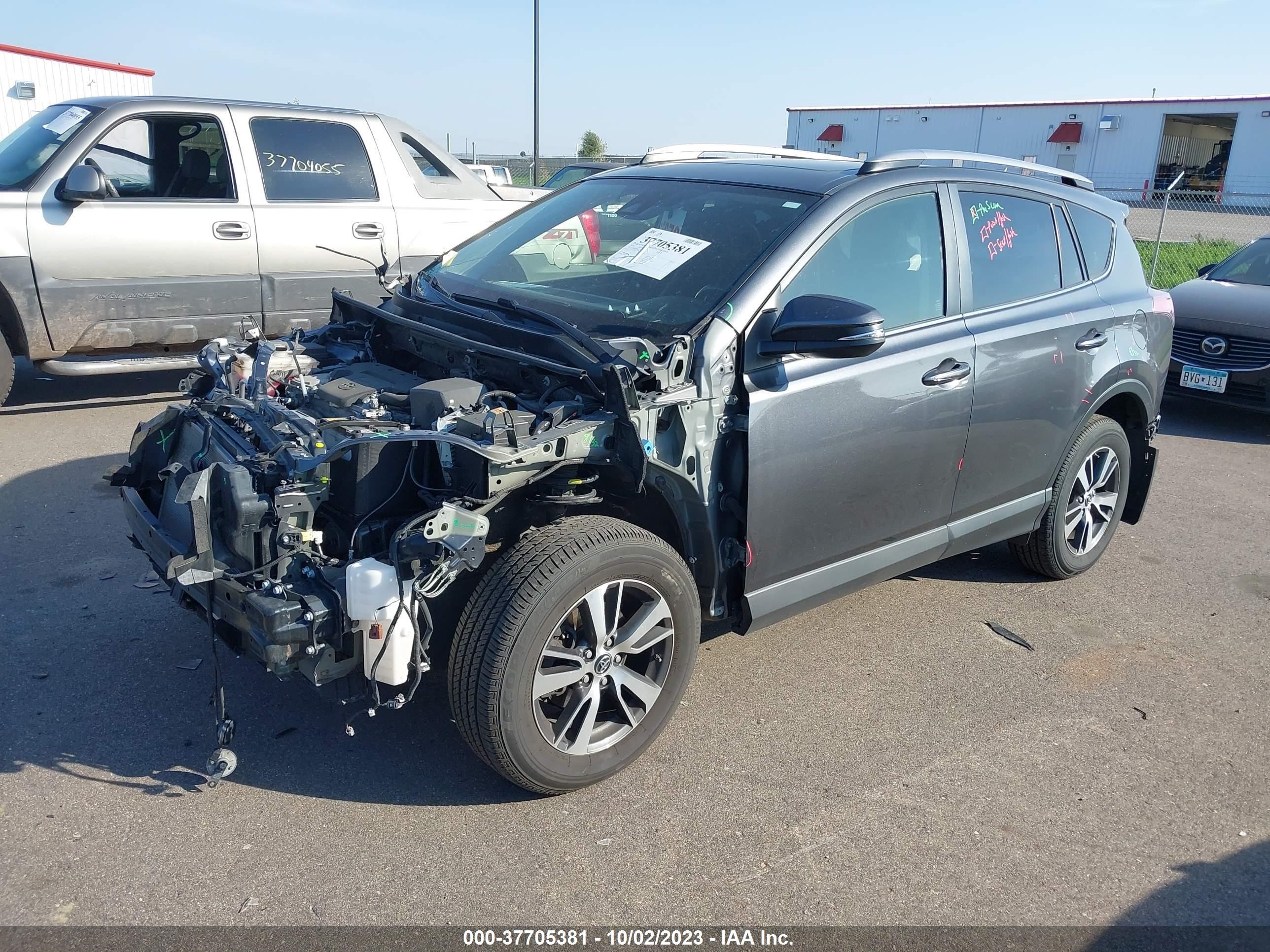 Photo 1 VIN: JTMRFREVXJD240200 - TOYOTA RAV 4 