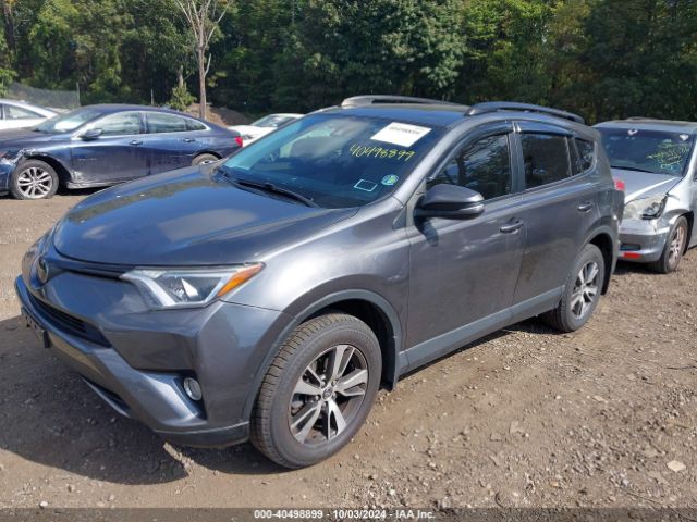 Photo 1 VIN: JTMRFREVXJD240455 - TOYOTA RAV4 