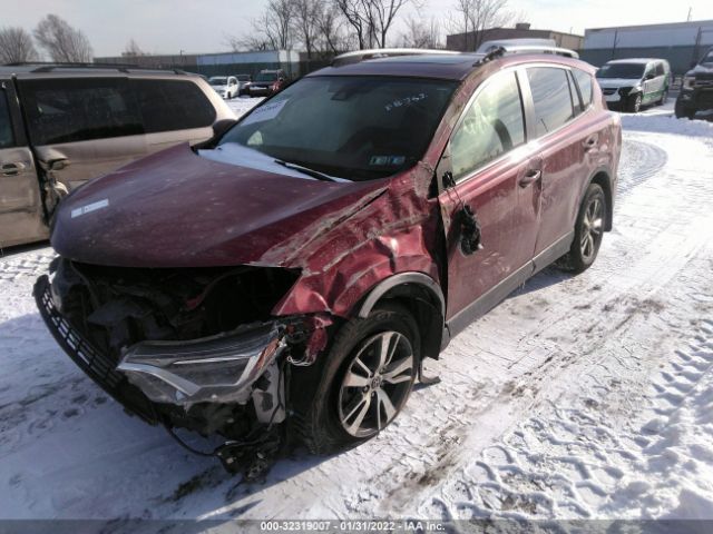 Photo 1 VIN: JTMRFREVXJD257403 - TOYOTA RAV4 