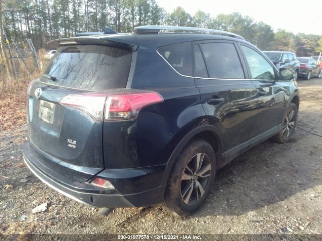 Photo 3 VIN: JTMRFREVXJJ239274 - TOYOTA RAV4 