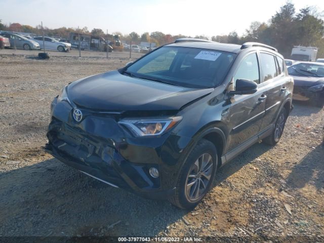 Photo 1 VIN: JTMRJREV0GD019096 - TOYOTA RAV4 HYBRID 