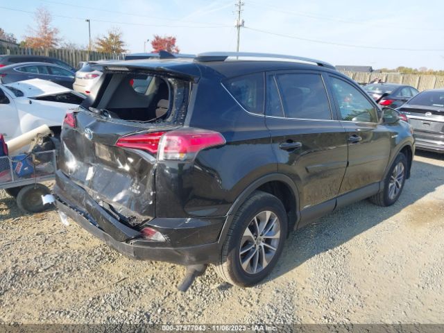 Photo 3 VIN: JTMRJREV0GD019096 - TOYOTA RAV4 HYBRID 