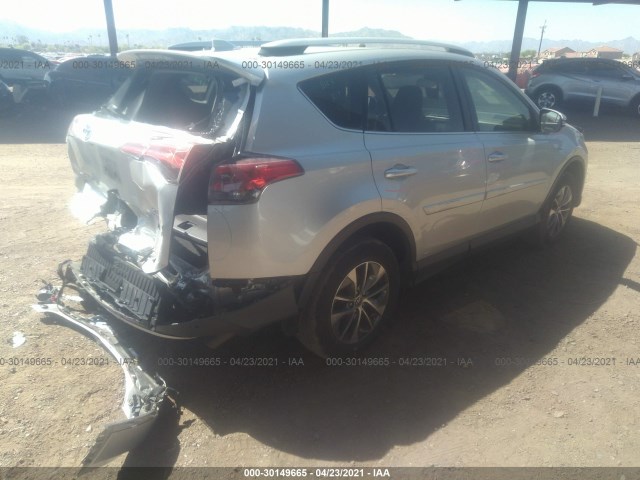 Photo 3 VIN: JTMRJREV0GD034438 - TOYOTA RAV4 HYBRID 