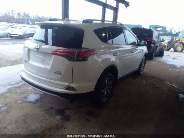 Photo 3 VIN: JTMRJREV0GD046248 - TOYOTA RAV4 HYBRID 