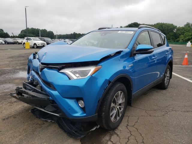 Photo 1 VIN: JTMRJREV0JD192690 - TOYOTA RAV4 HV LE 