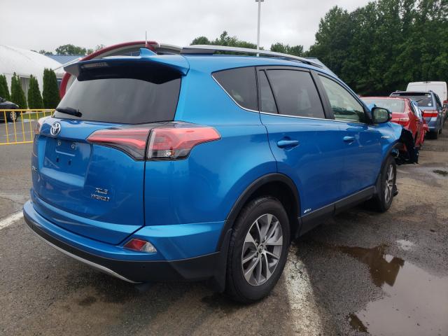 Photo 3 VIN: JTMRJREV0JD192690 - TOYOTA RAV4 HV LE 