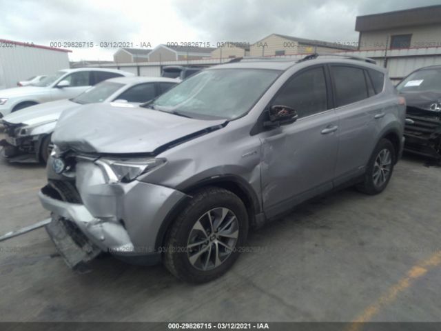 Photo 1 VIN: JTMRJREV0JD194570 - TOYOTA RAV4 