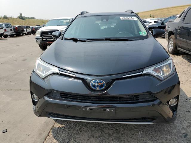 Photo 4 VIN: JTMRJREV0JD208631 - TOYOTA RAV4 HV LE 