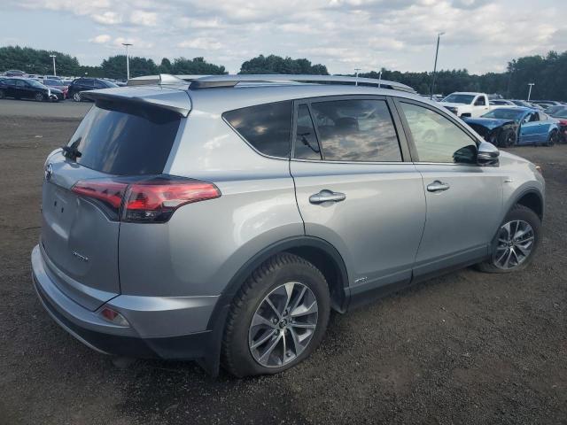 Photo 2 VIN: JTMRJREV0JD233688 - TOYOTA RAV4 HV LE 