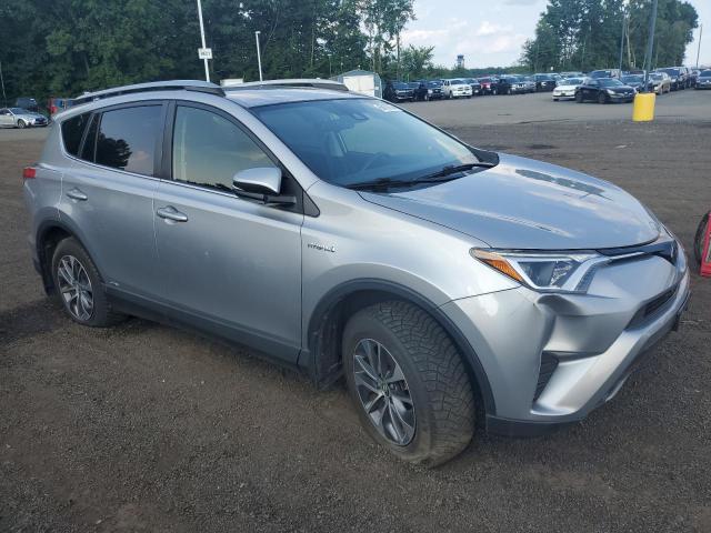 Photo 3 VIN: JTMRJREV0JD233688 - TOYOTA RAV4 HV LE 