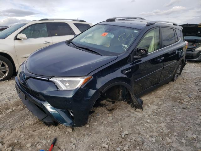 Photo 1 VIN: JTMRJREV0JD240365 - TOYOTA RAV4 HV LE 