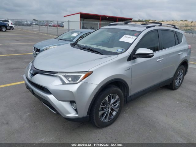 Photo 1 VIN: JTMRJREV1GD052575 - TOYOTA RAV4 HYBRID 