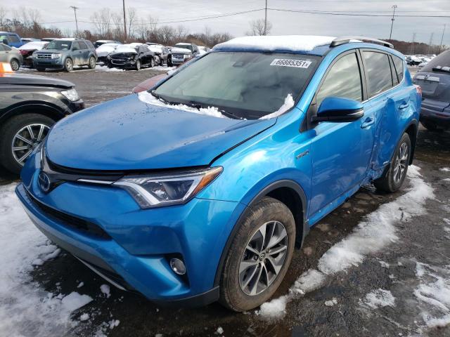 Photo 1 VIN: JTMRJREV1JD171007 - TOYOTA RAV4 HV LE 