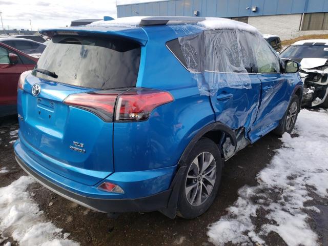 Photo 3 VIN: JTMRJREV1JD171007 - TOYOTA RAV4 HV LE 