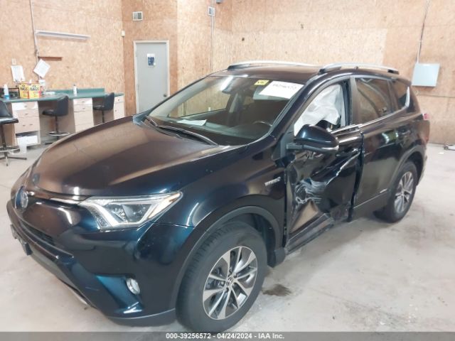 Photo 1 VIN: JTMRJREV1JD173324 - TOYOTA RAV4 HV 