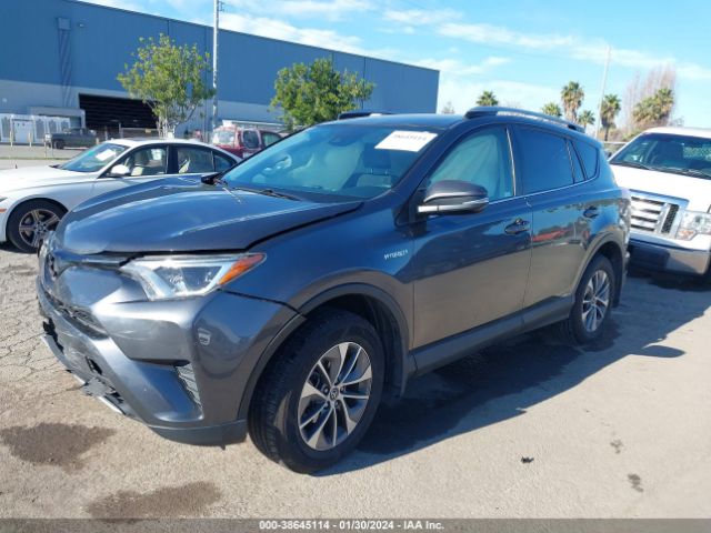 Photo 1 VIN: JTMRJREV1JD212249 - TOYOTA RAV4 HYBRID 