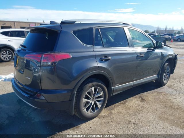 Photo 3 VIN: JTMRJREV1JD212249 - TOYOTA RAV4 HYBRID 