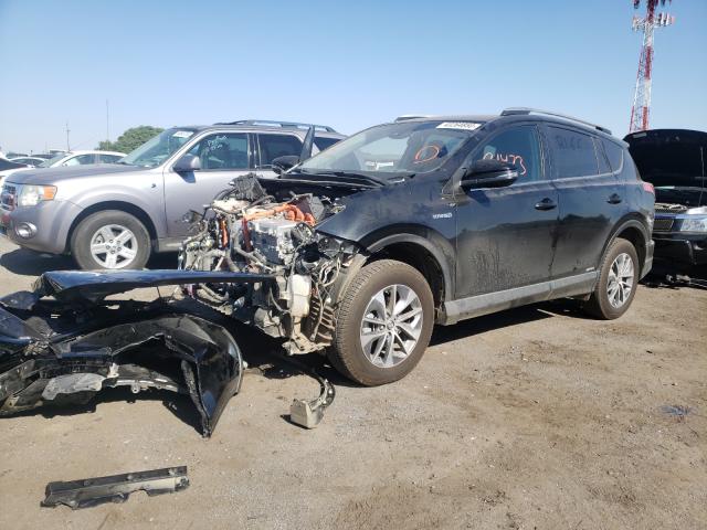 Photo 1 VIN: JTMRJREV1JD220769 - TOYOTA RAV4 HV LE 