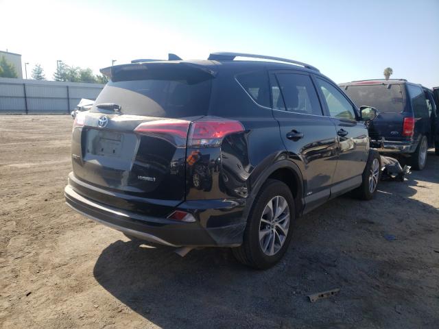 Photo 3 VIN: JTMRJREV1JD220769 - TOYOTA RAV4 HV LE 