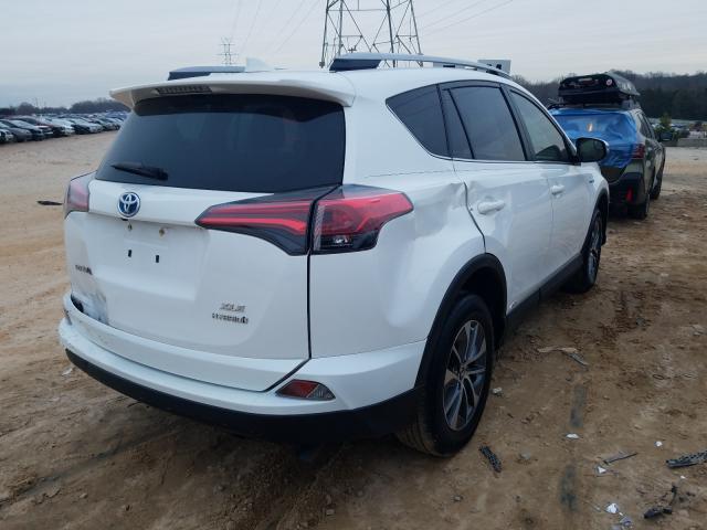 Photo 3 VIN: JTMRJREV2JD171386 - TOYOTA RAV4 HV LE 