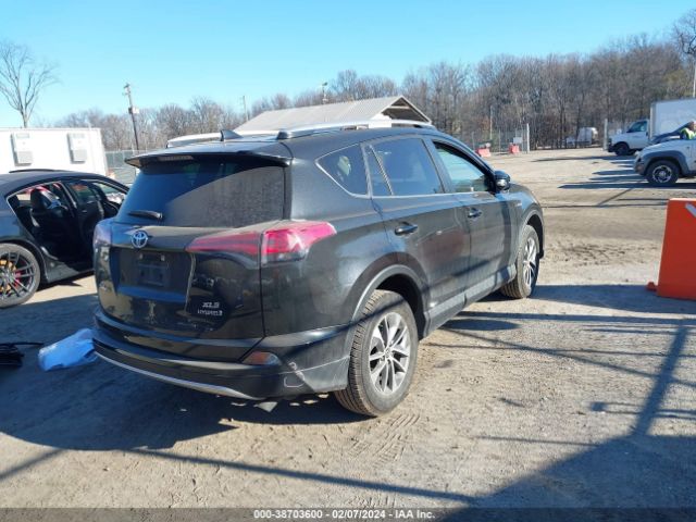 Photo 3 VIN: JTMRJREV3GD009209 - TOYOTA RAV4 HYBRID 