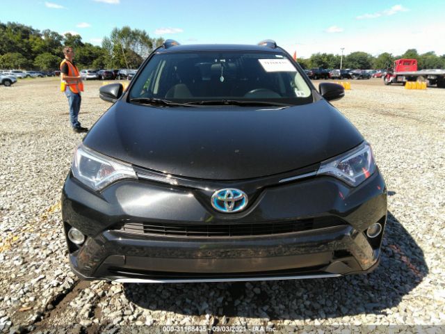 Photo 5 VIN: JTMRJREV3GD028200 - TOYOTA RAV4 HYBRID 