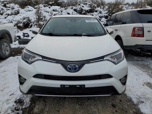 Photo 4 VIN: JTMRJREV3HD131800 - TOYOTA RAV4 HV LE 