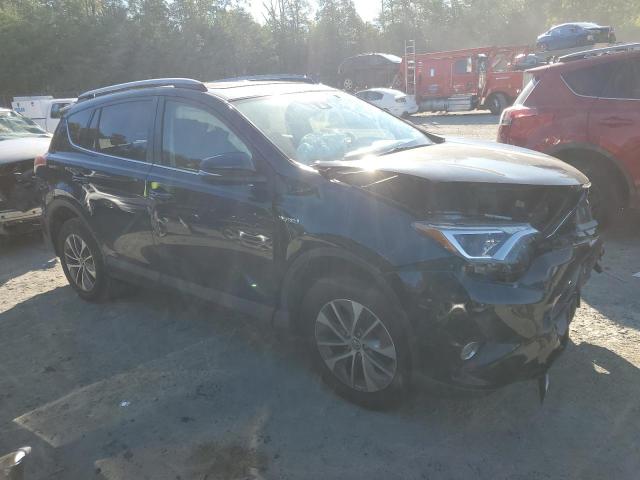 Photo 3 VIN: JTMRJREV3JD183594 - TOYOTA RAV4 HV LE 