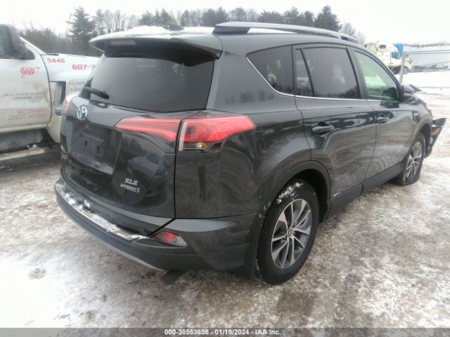 Photo 3 VIN: JTMRJREV3JD194238 - TOYOTA RAV4 HYBRID 