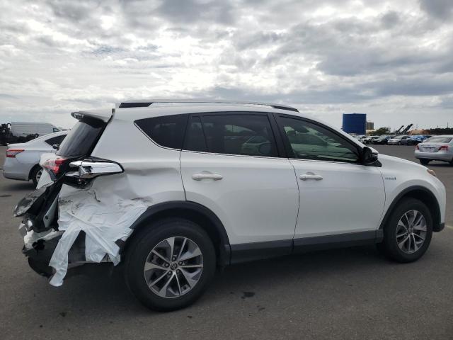 Photo 2 VIN: JTMRJREV3JD206016 - TOYOTA RAV4 HV LE 