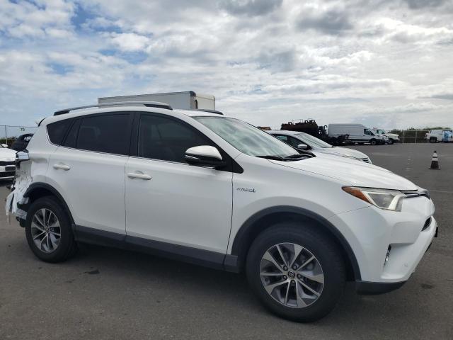 Photo 3 VIN: JTMRJREV3JD206016 - TOYOTA RAV4 HV LE 
