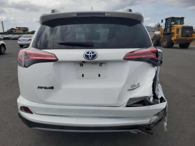 Photo 5 VIN: JTMRJREV3JD206016 - TOYOTA RAV4 HV LE 