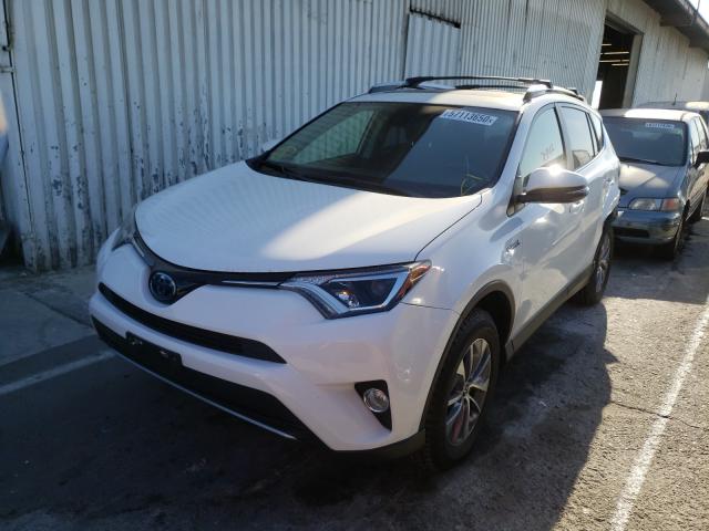 Photo 1 VIN: JTMRJREV3JD224760 - TOYOTA RAV4 HV LE 