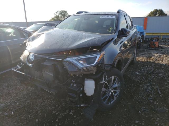 Photo 1 VIN: JTMRJREV3JD227206 - TOYOTA RAV4 HV LE 