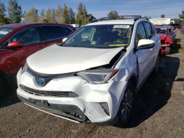 Photo 1 VIN: JTMRJREV3JD228260 - TOYOTA RAV4 HV LE 