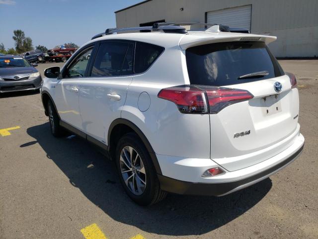 Photo 2 VIN: JTMRJREV3JD228260 - TOYOTA RAV4 HV LE 