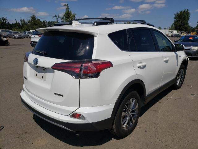 Photo 3 VIN: JTMRJREV3JD228260 - TOYOTA RAV4 HV LE 