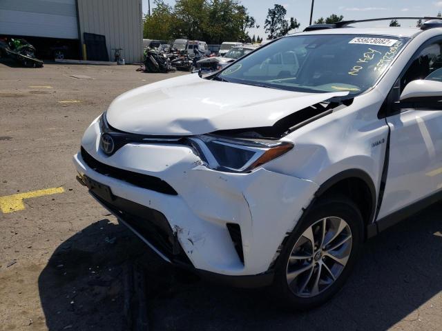 Photo 8 VIN: JTMRJREV3JD228260 - TOYOTA RAV4 HV LE 