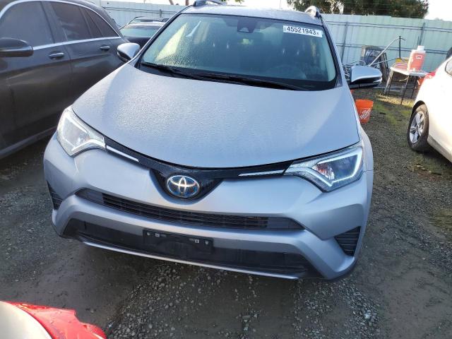 Photo 4 VIN: JTMRJREV3JD235743 - TOYOTA RAV4 HV LE 