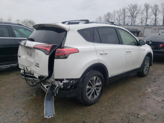 Photo 2 VIN: JTMRJREV3JD239999 - TOYOTA RAV4 HV LE 