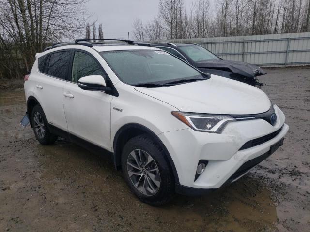 Photo 3 VIN: JTMRJREV3JD239999 - TOYOTA RAV4 HV LE 