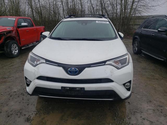 Photo 4 VIN: JTMRJREV3JD239999 - TOYOTA RAV4 HV LE 